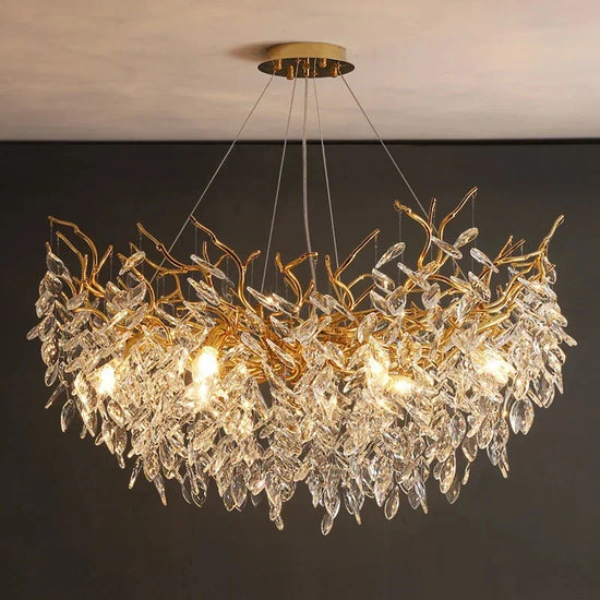 Gold crystal LED chandelier by DECORBITES featuring cascading crystal accents and warm LED lighting for elegant interior decor.