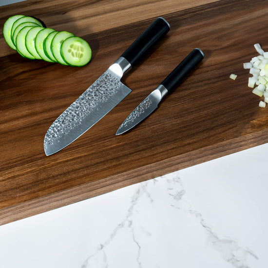 Swiss Diamond hammered Santoku and paring knife set, featuring durable stainless steel blades and ergonomic handles.
