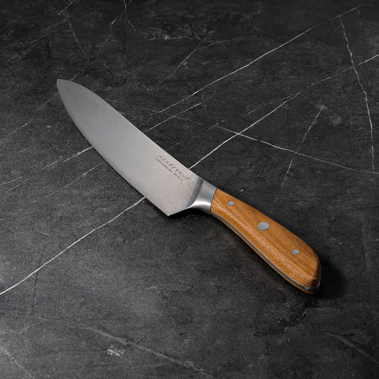 8-inch Damascus chef knife by Swiss Diamond, featuring a sharp, patterned blade and ergonomic handle for precise kitchen cutting.