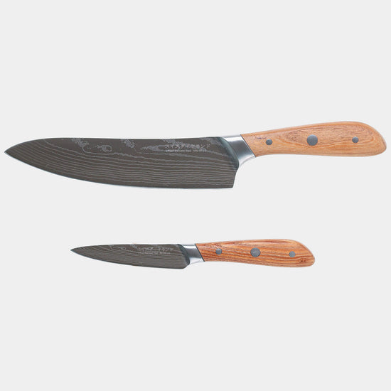Swiss Diamond Damascus Chef Paring Set featuring multiple high-quality paring knives with grey handles for precise kitchen prep.