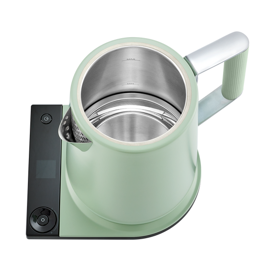 Saki Turkish Tea Maker Pro in sage green with glass pot and brewing infuser for traditional tea preparation.