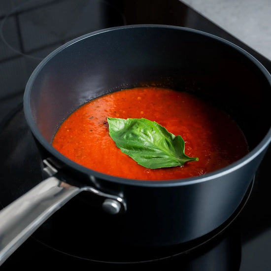Alva Cookware 2-quart saucepan with lid, stainless steel stock pot for cooking soups, sauces, and boiling ingredients.