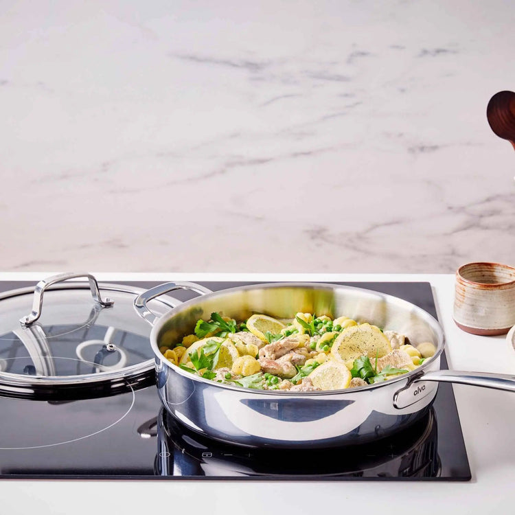 Alva Cookware 4-quart sauté pan with lid, stainless steel skillet perfect for frying and sautéing in the kitchen.