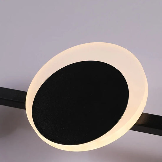 Modern LED wall sconce by Decorbites featuring an Art Deco design with sleek geometric metalwork and warm lighting.