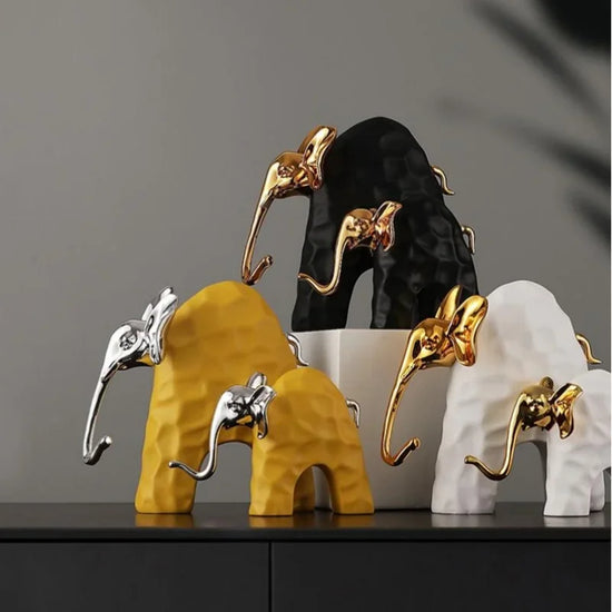 Decorbites elephant mother and calf resin sculpture, detailed golden figurine for home decor and accent decoration.