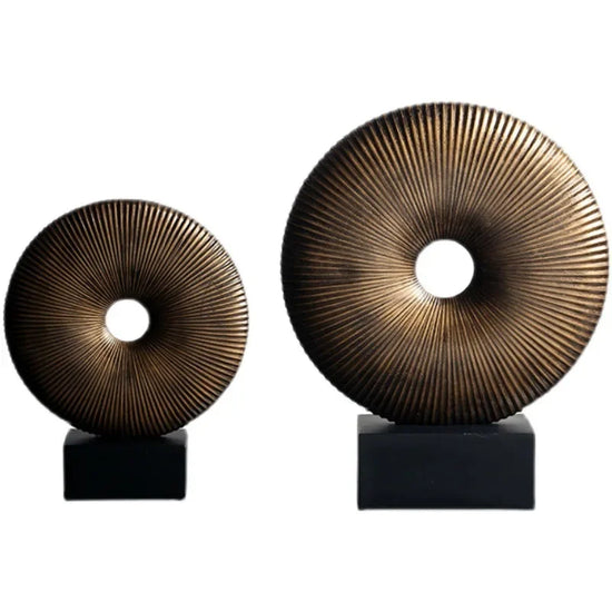 Elegant gold openwork ring sculpture by Decorbites, modern home decor accent piece featuring intricate openwork design.