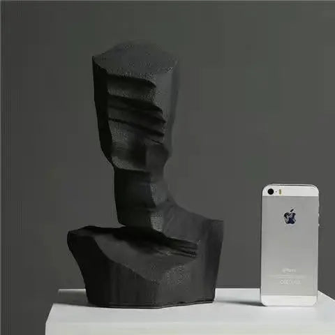 Modern abstract characters sculpture decoration by Decorbites, featuring artistic resin accents on a sleek display stand.