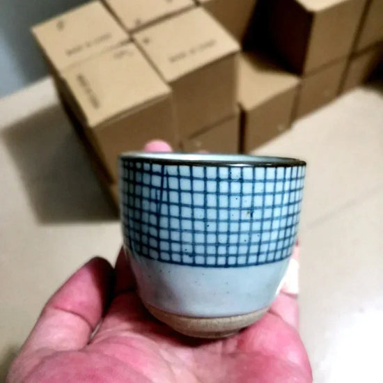 Hand-painted Japanese porcelain tea cup by Decorbites, eco-friendly ceramic mug with floral design, 100ml to 200ml capacity.