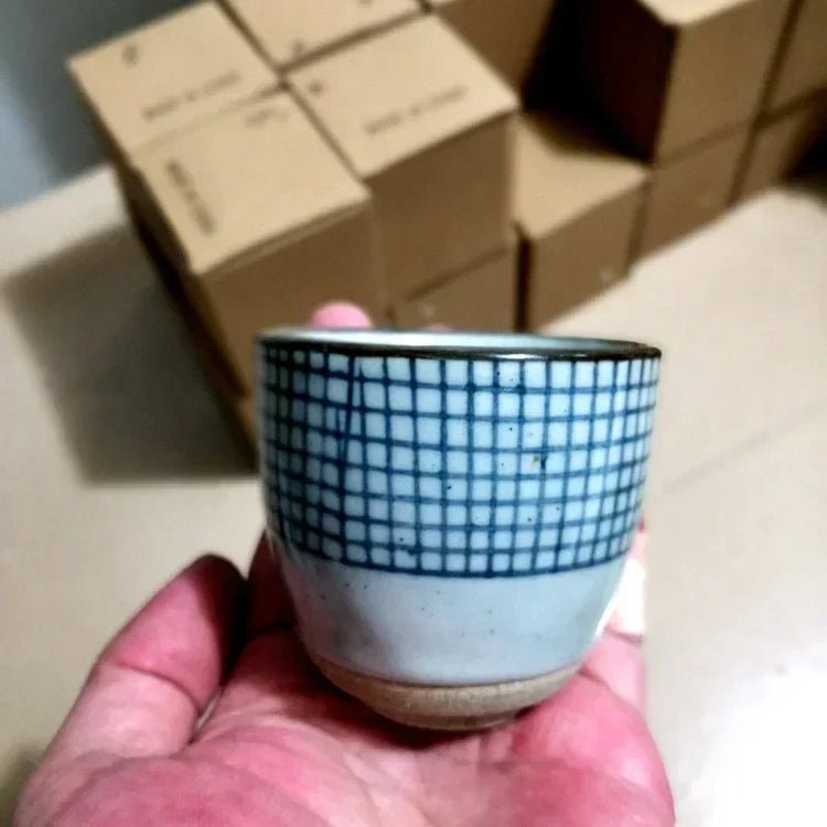 Hand-painted Japanese porcelain tea cup by Decorbites, eco-friendly ceramic mug with floral design, 100ml to 200ml capacity.