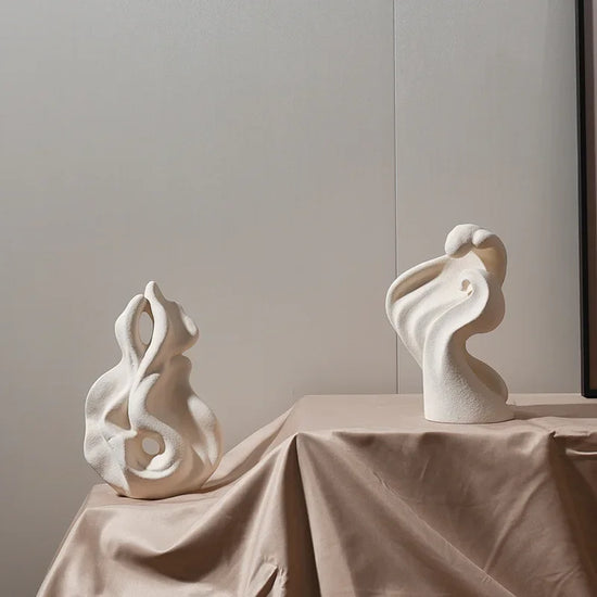Modern ceramic curl sculpture decor by Decorbites, showcasing a sleek porcelain art accent with smooth, flowing design elements.