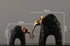 Decorbites elephant mother and calf sculpture in golden resin, detailed home decor figurine showcasing an elegant animal scene