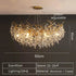 Gold crystal LED chandelier by DECORBITES with sparkling crystals and warm LED lighting, elegant lighting fixture for luxurious interiors