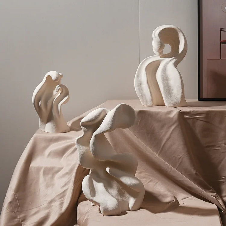 Modern ceramic curl sculpture decor by Decorbites, showcasing a sleek porcelain art accent with intricate, flowing design details.