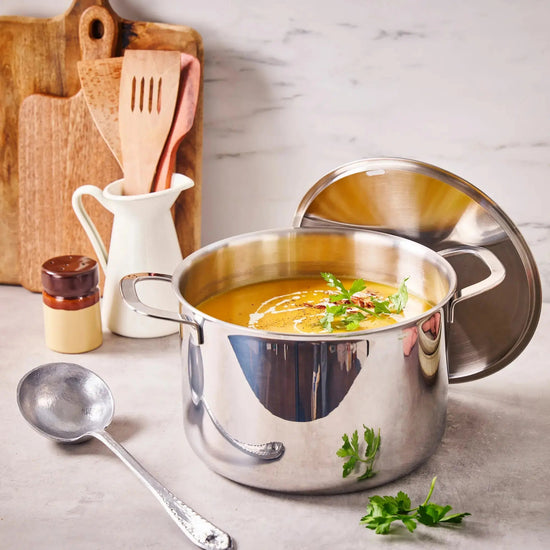 Alva Cookware 7 Qt. stock pot with lid, stainless steel cookware for soups and stews, front view showing handle and lid