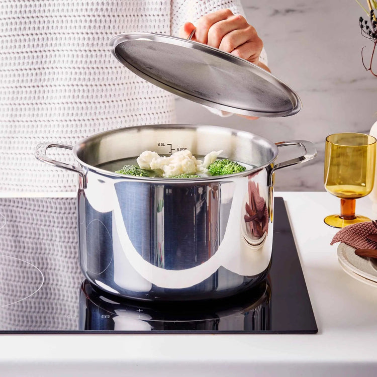 Alva Cookware 7 Qt. stock pot with lid, stainless steel, ideal for soups, stews, and large meal preparation.