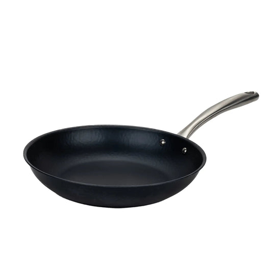Black Alva Cookware frying pan with a non-stick surface, shown from above with a sleek black finish.