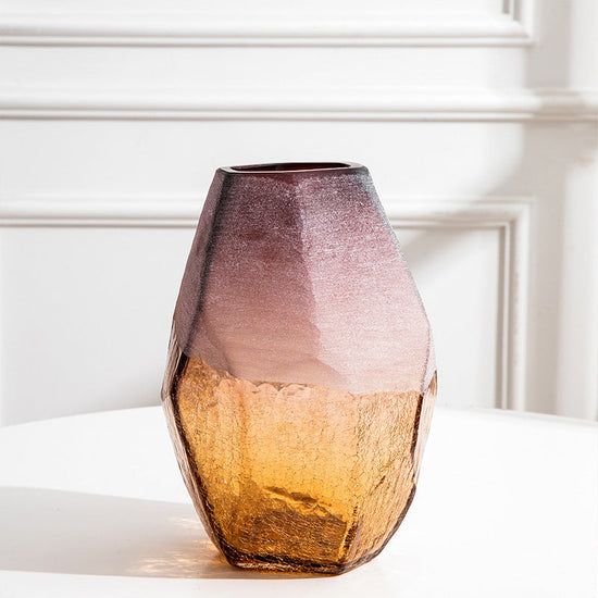 Set of three handmade blown glass vases by FLIPSTYLEZLLC featuring geometric faceted shapes with ombre purple amber finish, in varying sizes.
