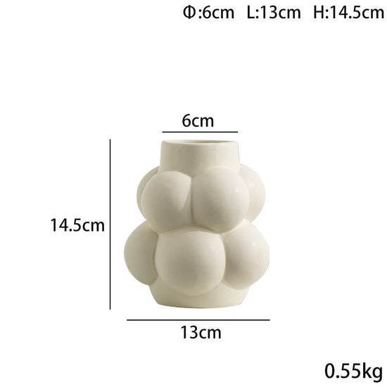 Simple Modern Bubble Ball Ceramic Vase by FLIPSTYLEZLLC, featuring a unique high-grade ceramic flower container with a soft indoor decorative style.