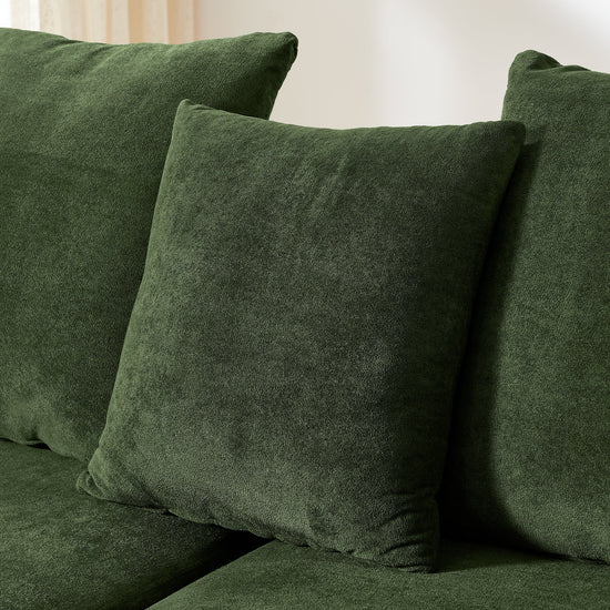 Green velvet L-shaped sectional sofa by HouseOfZazla, modern modular couch with plush cushions and sleek design.