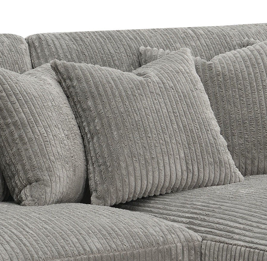 Gray Tavia L-shape reversible sectional sofa by HouseOfZazla with corduroy fabric, pocket coil cushions, and six pillows in a living room setting.
