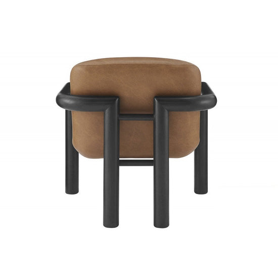 Modern faux leather accent chair with brown upholstery and black wood frame, stylish armchair for living room decor.