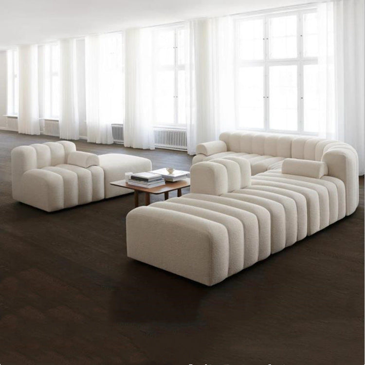 Off-white modern curved sofa in lamb velvet, sectional couch with sleek design, by FLIPSTYLEZLLC.