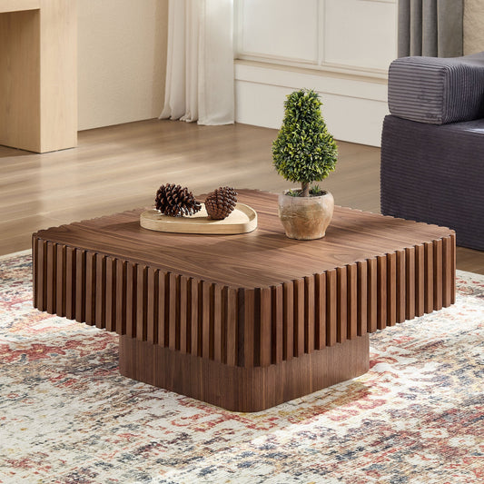 Modern 31.5-inch walnut drum coffee table with round top and pedestal base, stylish and sturdy living room accent piece.