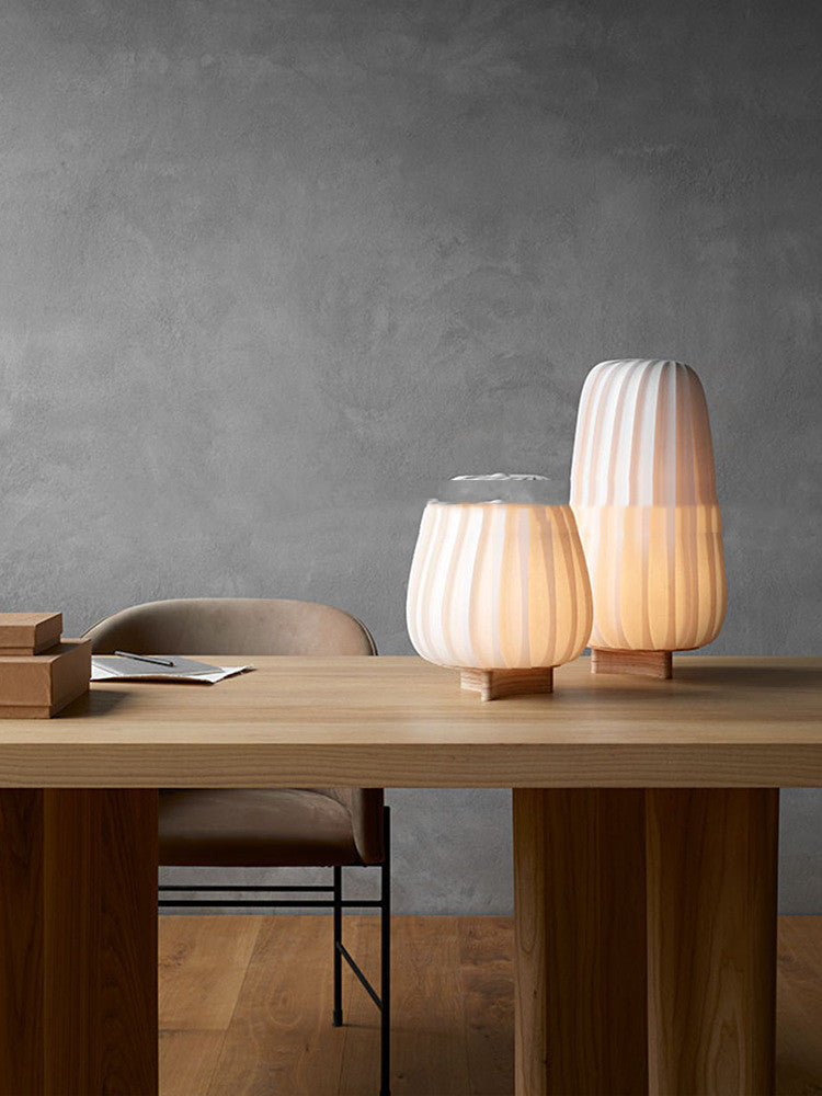 Modern minimalist FLIPSTYLEZLLC table lamp with sleek design, ideal for living room or bedroom decor, shown on a modern side table