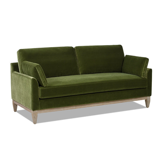 Norbrunn Eco Velvet Lounge Sofa by HouseOfZazla featuring a modern, sustainable velvet sofa with plush cushions and sleek design.