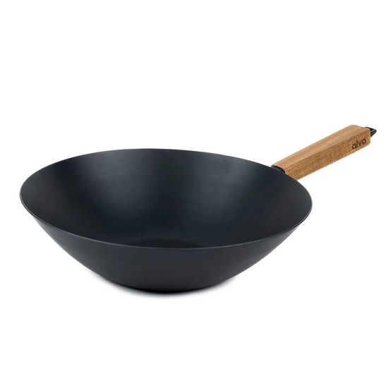 Alva Cookware 12-inch wok pan with a black exterior and wooden handle, ideal for stir-frying and Asian cuisine cooking.