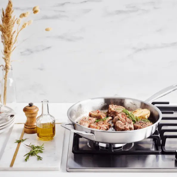 Alva Cookware 6-piece stainless steel cookware set includes pots and pans for versatile cooking.