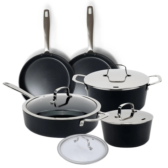 Alva Cookware 9-piece cookware set with pots, pans, and lids arranged on a stovetop for versatile cooking.