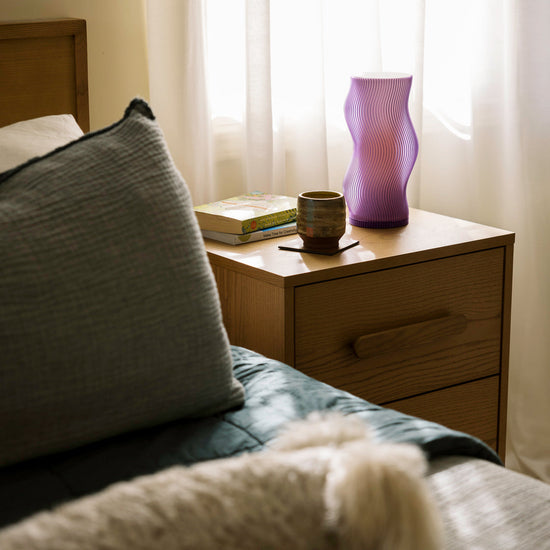Purple Terra Labs Woogie Table Lamp with rounded base and soft glow, ideal for modern home lighting.