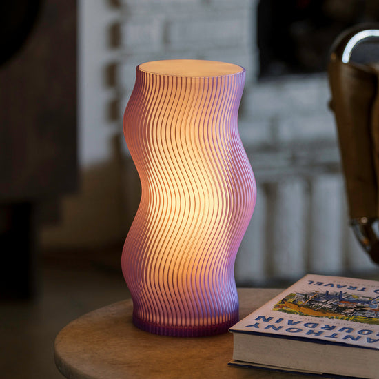 Purple Woogie Table Lamp by Terra Labs featuring a modern, round design with a soft glow, perfect for contemporary home decor.