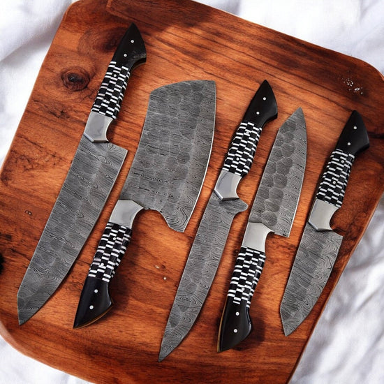 Premium Damascus kitchen knives set with epoxy resin handles, featuring sharp blades and ergonomic design for precise culinary prep.