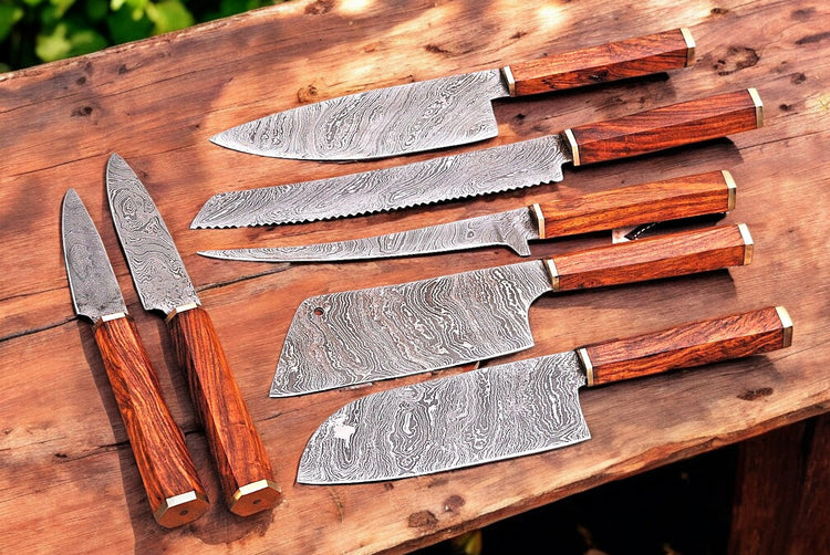 Premium Damascus kitchen knives set by Damascus Knife Store featuring handmade, sharp stainless steel blades and ergonomic handles.