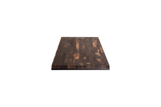 SteelCore™ Cutting Board by STEELPORT Knife Co. 18" x 12" durable stainless steel kitchen cutting surface shown from the front.