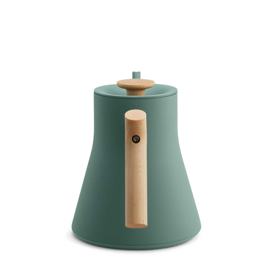 Fellow Stagg EKG Pro electric kettle in smoke green with maple handle, showcasing sleek design and digital controls.