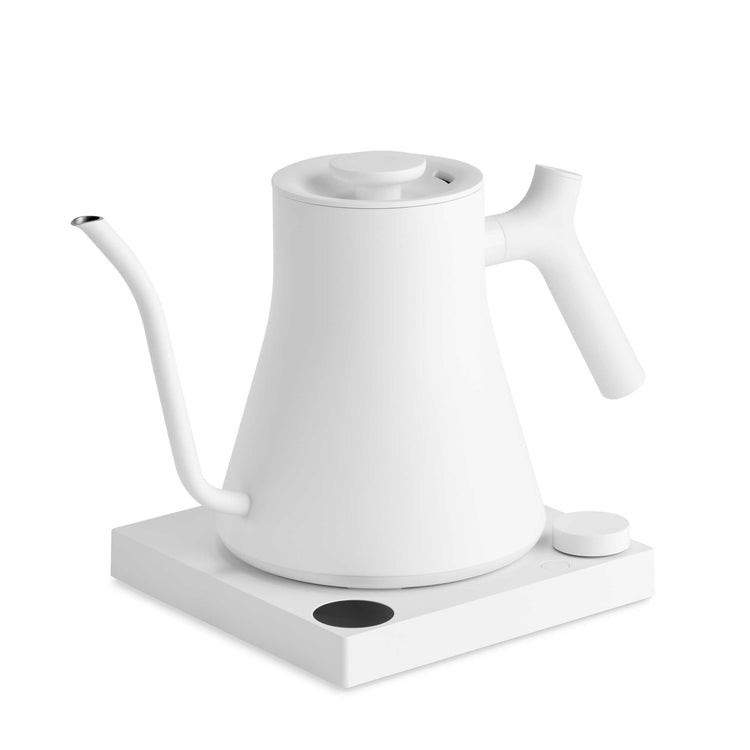 Fellow Stagg EKG Pro electric kettle in matte white with digital display and gooseneck spout, designed for precise pouring.