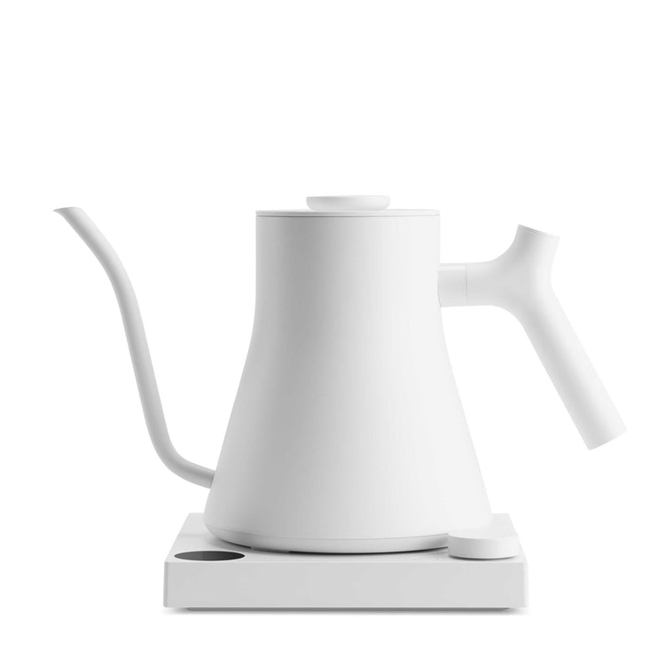 Fellow Stagg EKG Pro electric kettle in matte white with digital display and sleek handle, designed for precise coffee brewing.