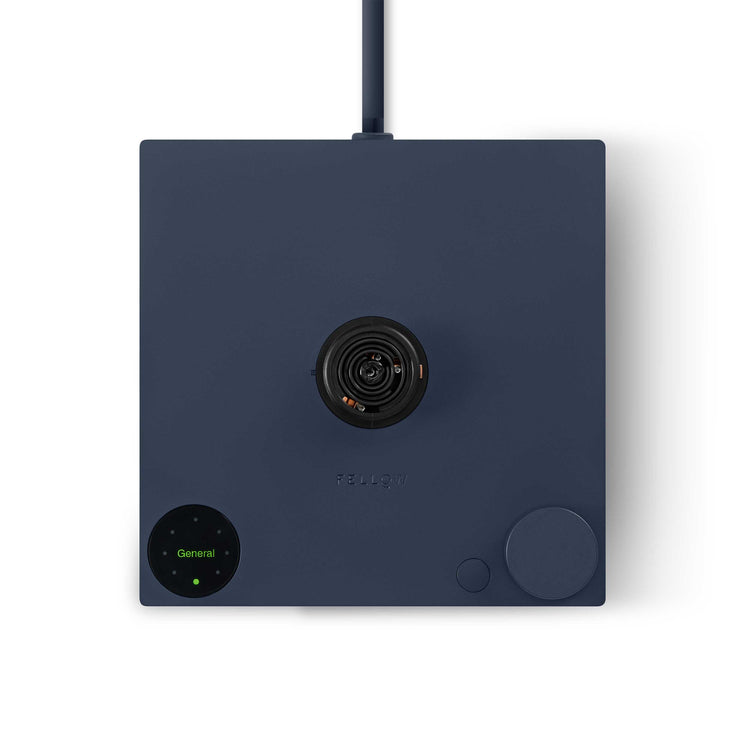 Fellow Stagg EKG Pro electric kettle in stone blue with walnut accents, featuring a sleek design and digital temperature control.