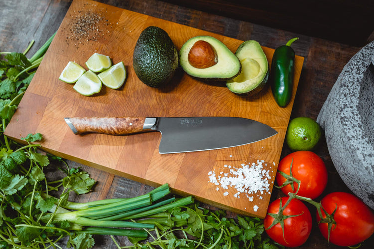 Steelport 6-inch chef knife with a sharp blade, ideal for chopping vegetables and kitchen prep.