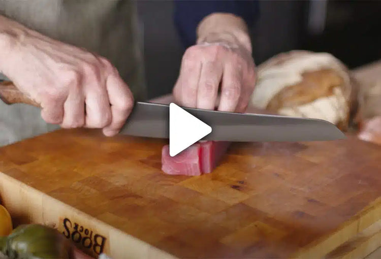 Steelport Knife Co. 10-inch slicing knife with sharp blade for precise cutting and slicing in the kitchen.