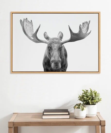Black and white moose framed canvas wall art by Amy Peterson Art Studio, featuring wildlife scene in natural home decor style.
