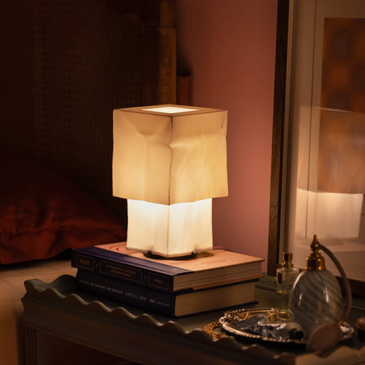 Wooj Design Farolito Lamp, warm ambient modern accent table lamp with a sleek, minimalist design and soft glowing light.