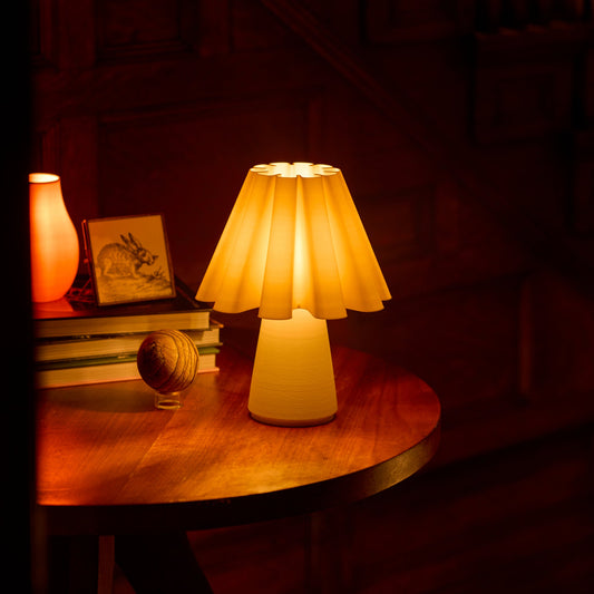 Wooj Design Ruff Lamp with soft fabric shade and modern wooden base, perfect for contemporary living room decor.