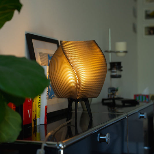 Modern Zephyr Lamp by Wooj Design featuring AI-designed sculptural 3D printed table lamp with intricate geometric details.