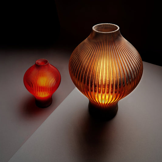 Smoke-colored Baleine Lamp by Wooj Design featuring a whale-shaped ceramic table lamp with a soft, ambient glow.